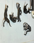 Black Rock Climbing Man Wall Statues Set