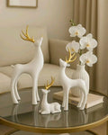 Elegant White Deer Statues Gold Antlers Set